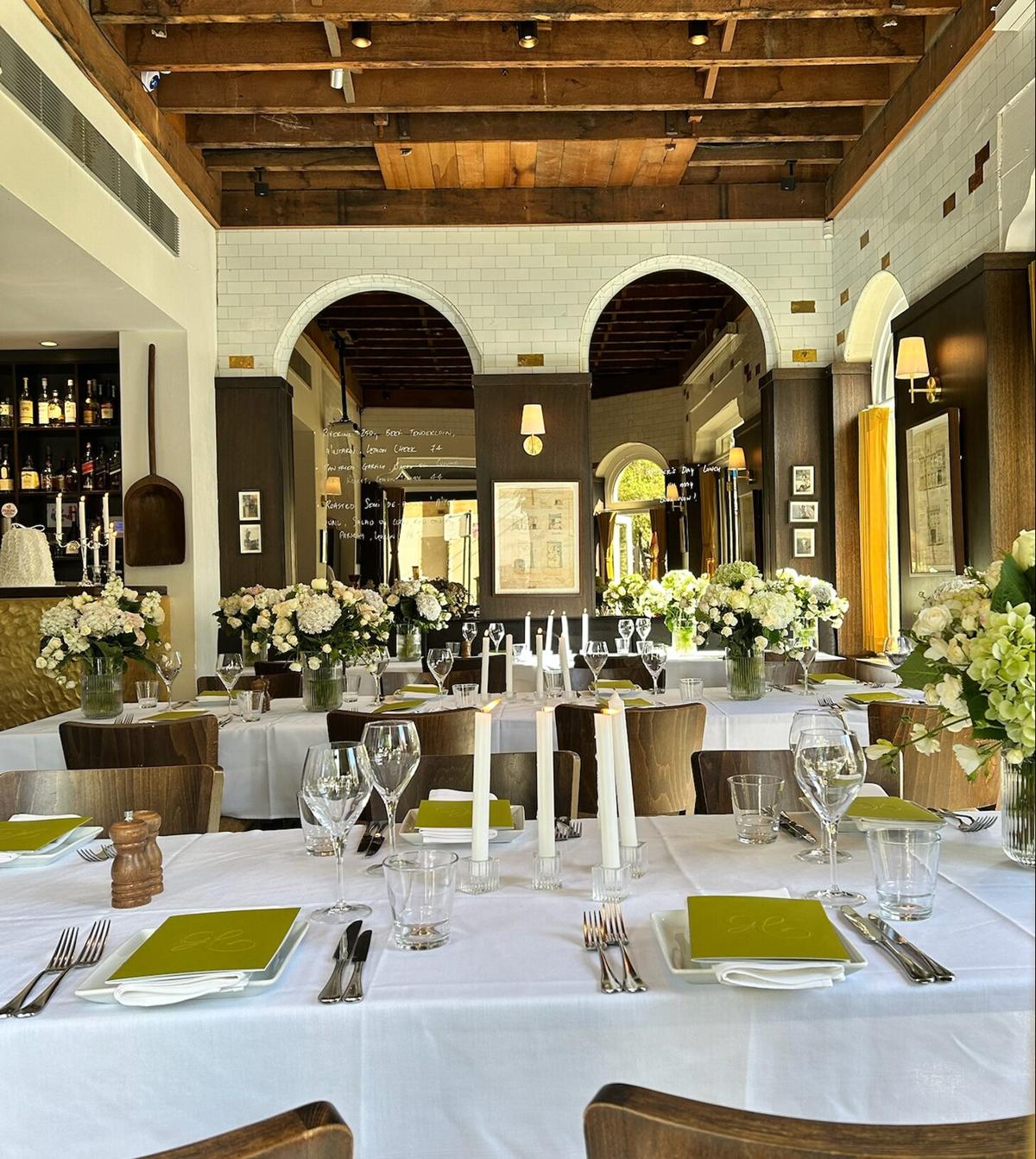 The Verde Darlinghurst dining room beneath sandstone arches