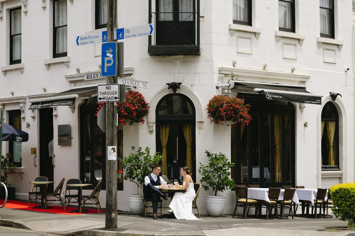 A couple at a private outdoor table outside Verde Darlinghurst